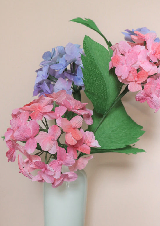 Load image into Gallery viewer, Hydrangea stem handcrafted with paper. Available in purple, blue and pink
